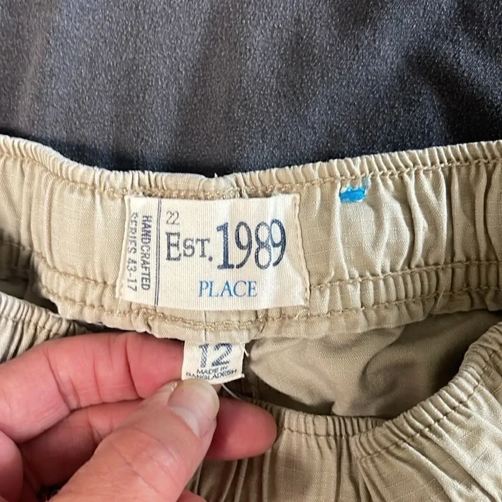 Children’s place cargo shorts.  Size boys 12.  Adjustable waist.